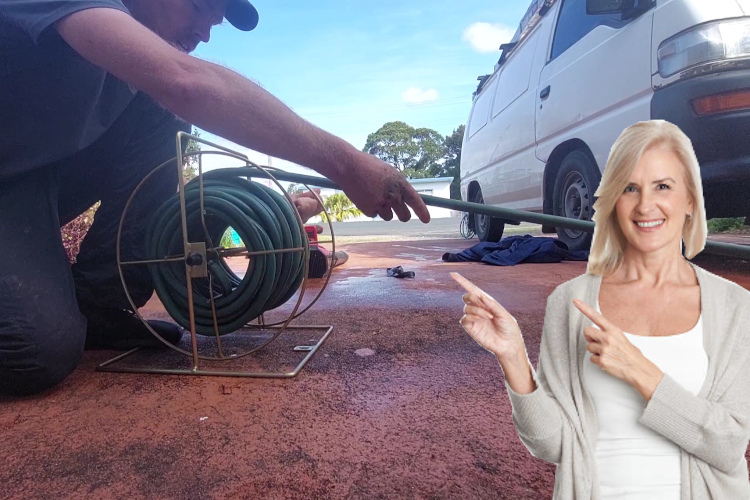 
Neatly coiling the hose, a ulladulla professional completes a successful day of gutter rinsing.